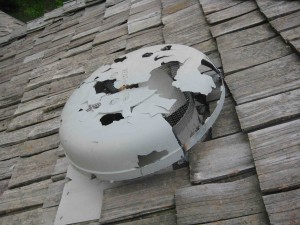 Severe hail damage on Minneapolis home wood roof after hail